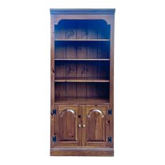 a wooden bookcase with two doors and shelves