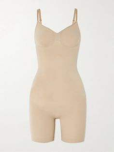 SKIMS' 'Seamless Sculpt' collection is designed to smooth and define the figure. Made from high-compression stretch fabric, this bodysuit has mid-length shorts and a scooped back, so you can wear it under low-cut dresses or tops. Fitted Beige Seamless Bodysuit, Compressive Full Coverage Seamless Bodysuit, Fitted Seamless Shapewear Bodysuit, Beige Stretch Full Coverage Bodysuit, Beige Stretch Bodysuit With Medium Bust Support, Full Coverage Seamless Bodysuit In Elastane, Compressive Lined Shapewear, Shaping Seamless Nylon Bodysuit, Shaping Nylon Seamless Bodysuit