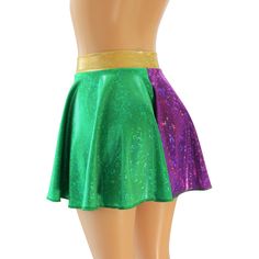 "Green and Purple Holographic Spandex Circle Skirt with a 2\" Hologram Wasitband. You are sure to be sparking at your next event in this sassy little skirt! WAISTBAND OPTIONS 1. GREEN HOLOGRAM 2. PURPLE HOLOGRAM 3. GOLD HOLOGRAM SKIRT LENGTHS Skirt Lengths: Front/Back Toddler 2/37\"/8\" Child X-Small 10\" / 11\" Child Small12\"/13\" Child 6X-711\"/12\" Child Medium13\"/14\" Child Large13\"/14\" Adult XS 13\"/14\" Adult Small 14.5\" / 16\" Adult Medium14.5\"/16\" Adult Large15\"/17\" Adult X-Larg Stretch Skirt For Cheerleading, Fitted Party Skirt With Elastic Waistband, Fitted Skirt With Elastic Waistband For Party, Green Stretch Skort For Party, Stretch Mini Skirt For Costume Party, Fitted Green Bottoms For Dance, Fitted Party Skort With Elastic Waistband, Fitted Green Bottoms For Costume Party, Fitted Cheerleading Skort