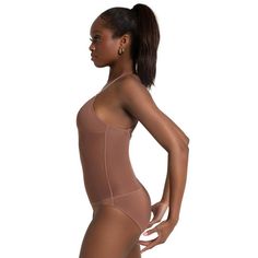 Elevate your performance in this plunging front neck leotard. Features padded cups and opaque mesh at the midriff that offers coverage and light compression. Comes with both clear and dyed-to-match bra straps that adjust and transition for different looks and functional support. Offered in a higher leg line to remain concealed under costumes. Stretch Nylon Leotard With Lined Body, Stretch Nylon Bodysuit With Built-in Bra, Stretch Sheer Polyamide Bodysuit, Sheer Stretch Polyamide Bodysuit, Compressive Leotard With Built-in Bra, Sheer Second-skin Nylon Bodysuit, Sculpting Nylon Bodysuit For Swimming, Seamless Second-skin Nylon Leotard, Nylon Shapewear Bodysuit For Workout