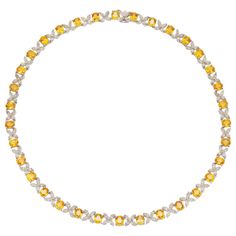 Necklace, finely crafted in 18k white gold with diamonds weighing a total of 10.81 carats and yellow sapphires weighing a total of 29.36 carats. Circa 2000. Luxury Yellow Gold Diamond Custom Necklace, Formal Yellow Diamond Necklace, Yellow Diamond Fine Jewelry Necklace, Yellow Diamond Necklace In Fine Jewelry Style, Fine Jewelry Yellow Diamond Necklace, Formal Yellow Diamond Necklace Fine Jewelry Style, Luxury Yellow Diamond Necklace With Accents, Luxury Yellow Necklace With Brilliant Cut, Luxury Yellow Necklace With Diamond Accents