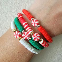 🎄 The listing is for Individual Christmas bracelets. These beauties can be worn by themselves, or with a stack!  I offer a variety of sizes from xs to xxl. You can find instructions on how to easily measure your wrist! 🎄All bracelets are FINAL SALE as these are custom orders. Please double check your bracelet size for optimal comfort fit  🎄 CARE INSTRUCTIONS: - Avoid contact with water to improve longevity. -Roll bracelets onto your wrist to avoid over stretching. If you have any questions or specific requests, please feel free to reach out in my messages! I will get back to you ASAP! DONT FORGET TO TAG ME ON INSTAGRAM WITH YOUR STYLING!!  https://www.instagram.com/theruffledpebble/ Christmas Charm Bracelets, Holiday Beaded Bracelets, Peppermint Christmas Bracelets, Christmas Jewelry fo Bracelets Christmas, Outfit Ideas Christmas, My Messages, Peppermint Christmas, Holiday Beading, Clay Bracelet, Christmas Gifts For Boyfriend, Christmas Bracelet, Bracelet Diy