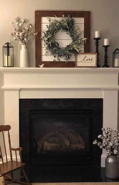 a fireplace with a wreath on top of it