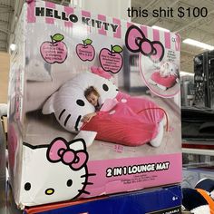 a hello kitty sleeping bag on display in a store