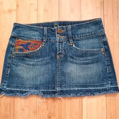 Grane Distressed Denim Mini-Skirt With Embroidered Right Pocket, Front Pockets And Back Pockets. Size: 5 Juniors Condition: New With Out Tag Was Never Used Measurements Laying Flat: Waist: 14 Inches Length: 12 Inches Embroidered Pocket, Denim Mini, Denim Mini Skirt, Distressed Denim, Mini Skirt, Womens Skirt, Color Blue, Mini Skirts, Skirt