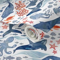 an ocean themed wallpaper with dolphins and corals in blue, red and white