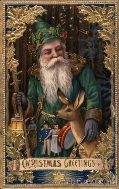 an old fashioned christmas card with santa holding a deer