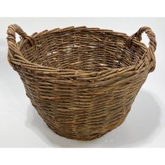 a wicker basket is shown on a white background