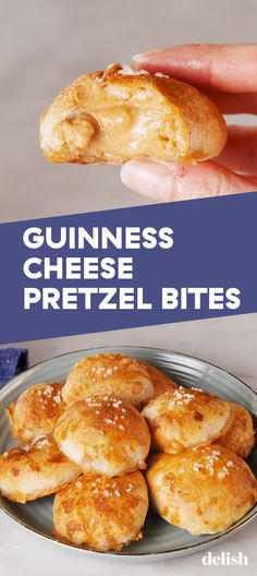 a person holding up a piece of bread with the words guinness cheese pretzel bites