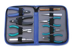 a blue case filled with lots of different tools