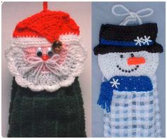 two crocheted snowmen with hats and scarfs hanging from hooks on the wall