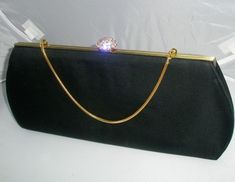 "This is a Beautiful Vintage eveningbag by Bobbie Jerome Crystal Latch, Satin Bag and satin lining.  This is a Very well taken care of Vintage Bag.  The bag is 11\"x5.5\" with a 10\" strap. The metal is in Amazing condition the satin is very clean.  Thanks for looking at our Eveningbag!" Elegant Rectangular Satin Bag, Elegant Satin Rectangular Bag, Luxury Satin Bags For Formal Occasions, Elegant Rectangular Satin Evening Bag, Elegant Satin Rectangular Evening Bag, Elegant Formal Bags With Satin Lining, Rectangular Satin Evening Bag For Party, Formal Satin Evening Bag With Satin Lining, Elegant Satin Evening Bag