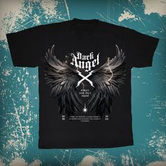 a black t - shirt with an angel design on the chest and two crossed swords