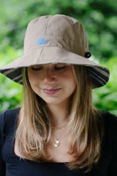 Camel & Cabana Stripe RAINCAP | Women's Bucket Hat - fashionable and practical rain gear by RAINRAPS Waterproof Wide Brim Sun Hat For Travel, Outdoor Packable Bucket Hat, Adjustable Waterproof Bucket Hat For Outdoor Activities, Casual Waterproof Sun Hat For Travel, Waterproof Brimmed Bucket Hat For Travel, Packable Curved Brim Bucket Hat For Outdoor, Waterproof Bucket Hat For Travel, Waterproof Adjustable Sun Hat With Curved Brim, Adjustable Waterproof Sun Hat With Curved Brim