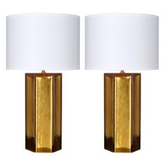 pair of modern brass table lamps with white shades