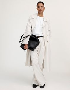 This easy trench coat features classic details like button cuffs, a belted waist and a back storm flap. Business Linen Outerwear, Chic Linen Outerwear For Business, Chic Linen Business Outerwear, Belted Linen Outerwear For Fall, Fall Linen Belted Outerwear, Chic Linen Outerwear With Button Closure, Chic Linen Outerwear With Hidden Button Closure, Timeless Belted Outerwear For Spring, Spring Linen Belted Outerwear