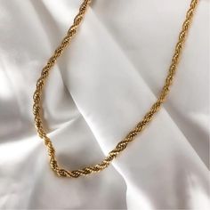 18k Gold Rope chain necklace Thick gold chain necklace Unisex chain necklace ꕥ 𝗢𝗨𝗥 𝗝𝗘𝗪𝗘𝗟𝗥𝗬 𝗜𝗦 ꕥ * High Quality * Handmade * Waterproof  * 100% Lead & Nickel Free  * Won't tarnish or discolour * Hypoallergenic * Recyclable ꕥ 𝗠𝗔𝗧𝗘𝗥𝗜𝗔𝗟𝗦 ꕥ * 18K Gold Plated PVD Stainless Steel * 5mm Rope Chain ꕥ 𝗣𝗔𝗖𝗞𝗔𝗚𝗜𝗡𝗚 ꕥ * Every piece comes in their own bag * 100% Recyclable Packaging ♺ ꕥ 𝗢𝗥𝗗𝗘𝗥 𝗧𝗜𝗠𝗘𝗦 ꕥ * Orders are shipped out within 1 Day ꕥ 𝗦𝗛𝗜𝗣𝗣𝗜𝗡𝗚 ꕥ 𝑼𝑺𝑨 🇺🇸 * Twisted Chain Necklace For Gifts, Gold Twisted Rope Chain Necklace, Gift Twisted Rope Chain Necklace, Minimalist Twisted Gold Jewelry, Gold Necklaces With Rope Chain And Link Shape, Gold Twisted Rope Chain Jewelry, Gold Plated Rope Chain Necklace, Gold Link Rope Chain Necklace For Gift, Gold Link Rope Chain Necklace Perfect For Gift