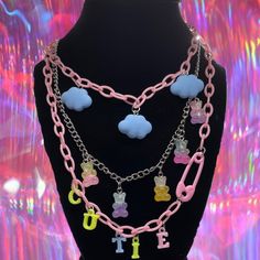 3 Layered Necklace Acrylic Chain With Clouds And The Word ‘Cutie’ On It. Bears In Silver Chain Length Is 17 Inches #Y2k #Set #Nostalgia #00s #Necklace Thanks In Advance Brand Set Vintage Nostalgia Virus Facemask Mask Top Croptop Skirt Pink Aesthetic Brown Inpiration Kawaii Luxury Baddieedits. Sailormoon Sailormars Sailor Trendy Pink Necklace With Adjustable Chain, Trendy Pink Chain Necklace With Adjustable Chain, Cute Pink Jewelry With Chain Detail, Cute Pink Jewelry With Chain, Playful Pink Jewelry With Adjustable Chain, Playful Pink Necklaces For Party, Pink Dangle Charm Necklace With Adjustable Chain, Pink Playful Party Necklaces, Playful Pink Necklace For Party