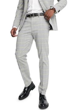 A flat front and tapered legs mean a modern fit in these skinny trousers featuring a neat windowpane pattern. 81% polyester, 18% viscose, 1% elastane Machine wash, line dry Imported Fitted Plaid Pants With Welt Pockets, Classic Fitted Plaid Bottoms, Classic Fitted Plaid Pants, Fitted Plaid Pants For Business Casual, Fitted Plaid Formal Bottoms, Formal Fitted Plaid Bottoms, Fitted Plaid Pants For Work, Fitted Plaid Bottoms For Business Casual, Fitted Plaid Bottoms For Workwear