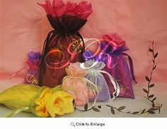 an image of a bag with flowers and ribbons on the front, next to it