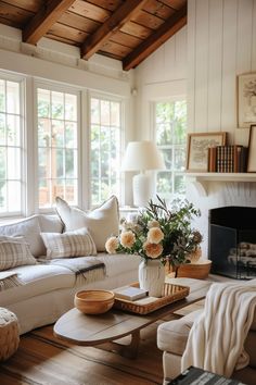 a living room filled with furniture and a fire place