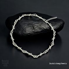 ⚡️ Dare to Be Bold with the Gothic Barbed Wire Thorn Chain Necklace! ⚡️ 🔗  Step into the dark, edgy world of Gothic fashion with this Barbed Wire Thorn Chain Necklace. Perfect for those who live on the edge of style, this statement piece combines punk rock aesthetics with a touch of rebellion. It's more than just a necklace--it's a symbol of power, individuality, and attitude. 🖤  The Ultimate Gothic Accessory Crafted with precision, the barbed wire and thorn design brings a raw, edgy vibe that Thorn Design, Gothic Mode, Bold Statement Jewelry, Metal Drop, Gothic Accessories, Barbed Wire, Halloween Jewelry, Trendy Accessories, Metal Necklaces