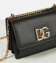 Find DOLCE & GABBANA 3.5 Small Leather Crossbody Bag on Editorialist. Material: leather. Lining: leather. Made in Italy. Internal details: two internal compartments, internal slot pocket. Closure: snap-buttoned fastening. Chain shoulder strap. Designer Bags With Leather Lining, Designer Evening Bags With Leather Lining, Designer Everyday Luxury Crossbody Shoulder Bag, Designer Evening Shoulder Bag With Leather Lining, Evening Crossbody Shoulder Bag With Leather Lining, High-end Leather-lined Crossbody Bags, Evening Crossbody Bag With Leather Lining, Designer Crossbody Flap Bag With Leather Lining, Designer Soft Leather Crossbody Shoulder Bag