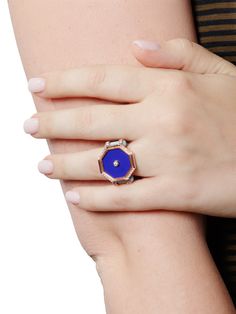 The Rabbit Pinky is handmade from 18K yellow gold, set with a striking blue enamel stone, and inlayed with a set of 0.13 carats of white diamonds framed in a resin setting. A stunning take on the classic signet ring. Handcrafted in 18K yellow gold. Detailed in white diamonds. Blue Enamel Ring With Polished Finish, Blue Enamel Ring Fine Jewelry, Blue Enamel Polished Round Ring, Blue Enamel Ring In Fine Jewelry Style, Blue Polished Enamel Ring, Blue Enamel Fine Jewelry Ring, Blue Enamel Ring With Polished Finish As Gift, Blue Enamel Ring With Polished Finish For Gift, Elegant Blue Enamel Ring With Gemstone