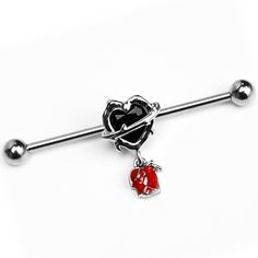 Product Details14 Gauge Barbed Heart Internally Threaded Dangle Industrial Barbell 38mm Keep your heart wrapped tight or this 14 gauge helix barbell will steal it. It is made with a 1 1/2 inch 316L surgical grade stainless steel straight barbell with 5mm ball ends. It features a black heart charm, with barbed wire detailing. Dangling beneath is a rose charm, with deep red leaves. It also features an internally threaded design for maximum comfort on insertion and removal and you can slide the charm up and down the length of the barbell for the perfect look. Even the blackest of hearts will melt for this gorgeous barbell earring.Specifications14 Gauge (1.6mm), 1 1/2" (38mm), 316L Surgical Grade Stainless Steel Straight Barbell, Internally Threaded Types Of Ear Piercings, Barbell Earrings, Industrial Barbell, Daith Piercing, Red Leaves, Barbed Wire, Ear Candy, Black Heart, Helix