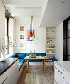 the kitchen is clean and ready to be used as a dining room or living room