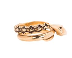 This fascinating 1950s Retro Serpent Ring is a multi-band ring crafted from 14k yellow gold. It has 2-3 bands depending on which side you look at. It has 1 smooth high polish band and 1 Diamondback textured band! It is set with 3 Akoya Pearls - 2 pearl eyes with 1 larger pearl in the mouth. The largest pearl measures 4 millimeters. This ring is slightly adjustable and the width tapers from 10-7 millimeters. This ring is fun, stylish and intriguing! Stack it like a band ring or wear it as a state Vintage 14k Gold Stackable Rings As Gift, Vintage Engraved Stackable Round Ring, Vintage Bronze 14k Gold Jewelry, Vintage Stackable Jewelry With Round Band, Vintage Brass Stackable Rings, Classic Gold Snake Ring For Formal Occasions, Vintage Gold Stackable Rings, Unique Yellow Gold Snake Ring, Vintage Round Band Stackable Rings