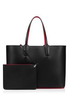 Metal-spiked loops anchor the over-the-shoulder handles of a spacious tote made from Italian calfskin and detailed with luscious lipstick-red trim. Embossed logo script brands the base, while a removable zip-top pouch does double duty as a convenient interior pocket or chic, minimalist clutch. Open top Top over-the-shoulder carry handles Removable zip-top pouch features an enameled logo charm zip pull and lipstick-red trim and lining Structured silhouette with flat, logo-embossed base for stability Calfskin leather/thermoplastic polyurethane Made in Italy Designer Handbags Christian Louboutin Purse, Louboutin Purse, Christian Louboutin Logo, Louboutin Bag, Minimalist Clutch, Dressy Hats, Louboutin Bags, Luxury Lipstick, Logo Script