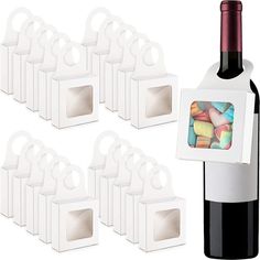 a bottle of wine next to some candy cubes