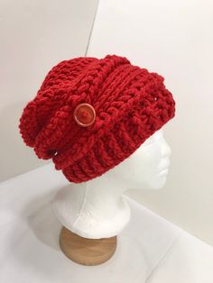 Crochet Slouch Hat with side button detail, perfect for those cold winter days. Statement hat that's chunky, bold, beautiful and cosy warm to wear! Colour: Deep Red with wooden side button detail. Made with Chunky acrylic yarn Other colours available separately in my Etsy shop https://www.etsy.com/uk/shop/MissJennies Please note: ★ every attempt is made to make photos true to colour however you may have a slight variation on shade.★ SIZE: Adult / teen size: 20 - 22" circumference ★ ★ MEDIUM/LARG Womens Beanie, Star Baby Blanket, Crochet Slouch Hat, Statement Hat, Women Hats Fashion, Slouch Beanie, Slouch Hat, Grey Beanie