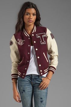 Women's True Religion Richie Varsity Jacket in Plum; Size Small. Description: * Shell: 80% wool, 20% polyamide.  * Sleeves: 100% cow leather.  * Lining: 100% poly.  * Button front closure.  * Side double welt pockets.  * Rib knit edges.  * Contrast color blocking.  * Leather sleeves and pocket trim.  * Embroidered logo and patches.  * Dry clean only.  SIZE and FIT: Modeled in size S. Model Measurements: Height 5'11", Waist 25", Bust 32, Hips 35". *** Approximate Measurements: Length (from mid co Sheepskin Coat Mens, Mens Leather Blazer, Leather Trench Coat Woman, Mens Leather Shirt, Senior Jackets, Letter Jacket, Suede Jacket Men, Leather Shorts Women, Leather Blazer Women