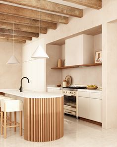 a kitchen with white cabinets and wooden accents