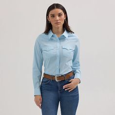 CLASSIC AND ICONIC You’ll look sharp and ready to conquer the world in our Women’s Wrangler Retro® Western Button-Down Shirt. It’s crafted from a comfortable cotton blend with just a hint of stretch. It comes with our signature chest flap pockets and “W” stitching as well as Western yokes, a pointed collar, and a full button closure for easy layering. Get one for every day of the week. Work Pants Women, Conquer The World, Retro Western, Loose Fit Jeans, Work Shirts, Western Outfits, College Outfits, Blue Shirt, Western Fashion