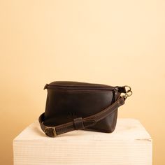 Handmade small fanny pack bag made from Brown cowhide leather. - One compartment inside - adjustable strap 1,5 cm / 0.6 in width and with maximum length of 95 cm / 50 in - closes on zipper - cotton lining - smal insidel pocket for little sings DIMENSIONS: Height: 10 cm / 3.9 in Width: 28 cm / 11 in Depth: 15 cm / 5.9 in We are providing 2 years warranty on our products. If you would like to receive information about SALES and PROMOTIONS please message us your email or Follow us on Instagram @bac Brown Leather Belt Bag With Cell Phone Pocket, Brown Leather Belt Bag With Mobile Phone Holder, Brown Leather Belt Bag With Phone Holder, Brown Leather Belt Bag For Mobile Phone, Brown Leather Mobile Phone Belt Bag, Brown Shoulder Belt Bag For Everyday Carry, Brown Business Belt Bag With Adjustable Strap, Brown Belt Bag With Adjustable Strap For Business, Everyday Leather Belt Bag With Smooth Grain