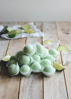 lime and white chocolate truffles on wooden table