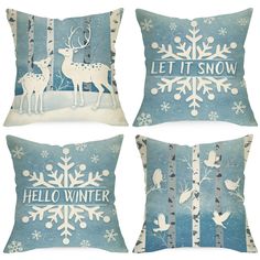 four pillows with snowflakes and deers on them, one has let it snow