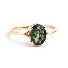 Moss agate engagement solitaire ring, Oval cut Studded With Moss agate ring, Solitaire moss agate ring, Anniversary ring / Promise ring Gift ≫ Features * SKU : A014 * Gemstone : Natural Moss Agate * Stone Shape : Oval  * Agate Weight : 0.8 ct * Stone Size : 6x8 mm * 14K Solid Yellow Gold, ( Available in 14K & 18K Yellow, Rose, and White Gold ) * Option available in 18K Gold * All size available * Ready to Ship in 1-2 Weeks ≫ FAQ below for more detail. ✦ Sizing We can adjust most items to fit you Solitaire Ring Oval, Moosachat Ring, Moss Agate Jewelry, Moss Agate Ring, Promise Ring Gift, Ring Oval, Agate Ring, Ring Promise, Anniversary Ring