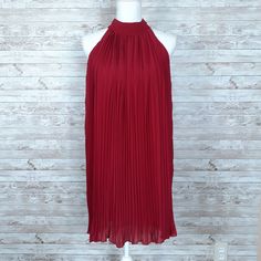 This Is A New Halter Style Dress. It's Pleated And Lined. Size Medium Armpit To Armpit: 19" Length:32" Red Sleeveless Halter Dress For Date Night, Red Pleated Sleeveless Mini Dress, Red Sleeveless Pleated Mini Dress, Pleated Halter Neck Sleeveless Dress For Date Night, Sleeveless Pleated Flowy Dress, Sleeveless Pleated Cocktail Dress, Pleated Sleeveless Halter Dress For Date Night, Sleeveless Pleated Halter Dress For Date Night, Flowy Sleeveless Pleated Dress