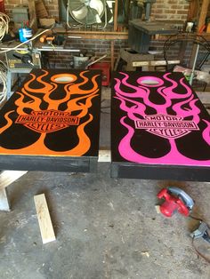 two cornhole boards sitting on top of a table