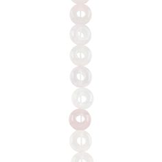 a white and pink beaded necklace on a chain with beads in the shape of donuts