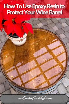 a table with poinsettis on it and the words how to use epox resin to protect your wine barrel