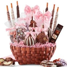 a basket filled with lots of chocolates and candies