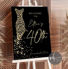 a black and gold wedding sign with the words welcome to her 40 years on it