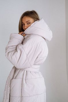 "Charming cozy comfortable coat oversized wrap blanket under the belt with a hood and large front pockets.  The coat is made of raincoat fabric, which does not get wet or blown out on the insulation.  A great option for every day and special occasions, which will always be comfortable and warm, regardless of the weather.  This wonderful beige blanket coat is made especially for you!    DETAILS  - beige color  - raincoat fabric with insulation - long blanket  - hood  - pockets  - tied with a belt  - oversized size   SIZES This blanket coat is available oversized  Full length 49\"/ 125 cm Sleeve length 23\"/ 60 cm More selection of dresses and other clothes here https://www.etsy.com/uk/shop/ElenaKosminskaya SHIPPING Standard shipping (14-30 days) is FREE for you. Worldwide. Any country.  If Cozy Cream Outerwear For Winter, Beige Oversized Hooded Puffer Jacket, Oversized Beige Hooded Puffer Jacket, Cozy Winter Puffer Jacket With Pockets, Cozy Puffer Jacket With Pockets For Winter, Hooded Winter Outerwear For Loungewear, Winter Hooded Loungewear Outerwear, Hooded Outerwear For Winter Loungewear, Winter White Outerwear For Loungewear