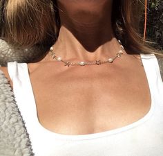 "Late 90s/Y2K dainty silver and freshwater pearl chain necklace Daisy accents Cute worn solo or layered up Excellent vintage condition, normal light wear with no significant flaws noted. Approx. 17\" long Tag reads 925 China, it's def true vintage, my mom received it as a gift in the late 90s/early years of 2000s Real freshwater pearl and silver All items are sold as is with no returns and no partial refunds. I describe and measure items carefully but may miss a slight flaw and all measurements Dainty Charm Necklace With Delicate Chain For Summer, Dainty Charm Necklaces With Delicate Chain For Summer, Summer Silver Pearl Chain Jewelry, Trendy Pearl Jewelry With Delicate Chain, Dainty Pearl Chain Charm Necklace Choker, Dainty Pearl Chain Charm Necklace, Dainty Pearl Chain Choker Necklace, White Dainty Choker With Clavicle Chain, Summer Pearl Jewelry In Silver