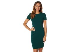 Calvin Klein Short Sleeve Sheath Dress - Women's Dress : Malachite : Make power moves in this Calvin Klein Short Sleeve Sheath Dress. Day-to-night dress in a sheath silhouette. Solid colorway on a faux-suede fabrication. Round neckline and short sleeves. Darting and structured seaming for a polished finish. Exposed zipper back closure. Straight hemline falls at knees. 90% polyester, 10% spandex. Dry clean only. Imported. Measurements: Length: 38 in Chest Measurement: 28 in Sleeve Length: 11 in P Power Moves, Day To Night Dresses, Calvin Klein Shorts, Exposed Zipper, Womens Calvin Klein, Night Dress, Sheath Dress, Round Neckline, Faux Suede